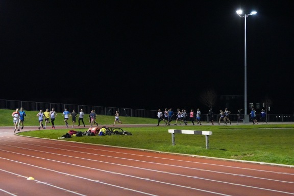 Highgate Harriers running on athletic track